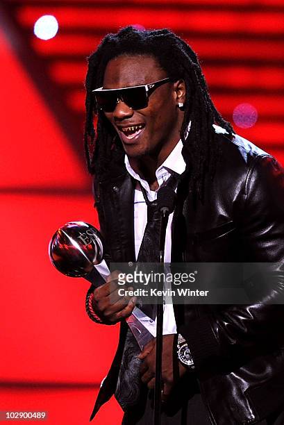 Player Chris Johnson of the Tennessee Titans accepts the Best Breakthrough Athlete Award onstage during the 2010 ESPY Awards at Nokia Theatre L.A....