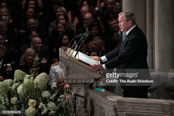 Former U.S. President George Bush delivers a eulogy during the funeral for U.S. Sen. John McCain at the National Cathedral on September 1, 2018 in...