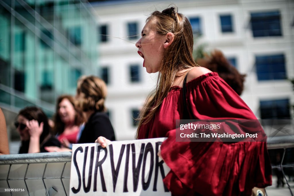 Meghan Downey of Chatham, New Jersey protests outside as U.S. Education Secretary Betsy DeVos announces changes in federal policy on rules for investigating sexual assault reports on college campuses in Arlington, Virginia...