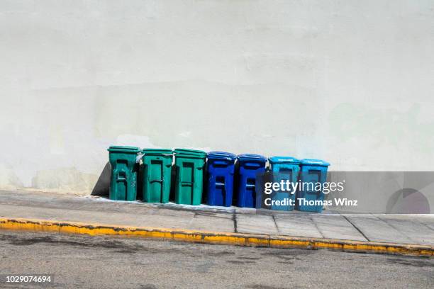 garbage containers - curb stock pictures, royalty-free photos & images