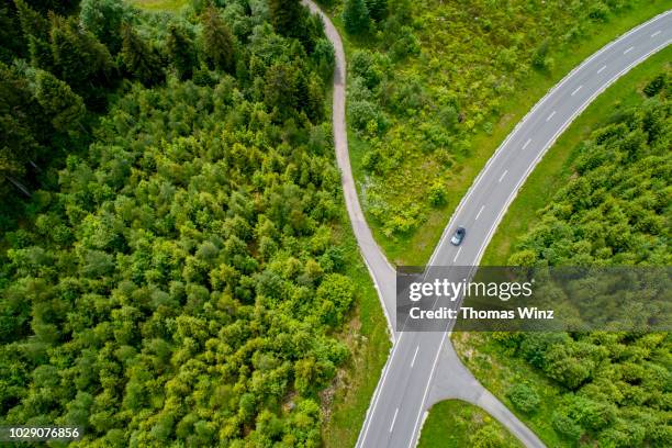 crossing country roads - car underside stock pictures, royalty-free photos & images