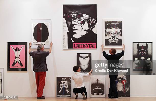 Curators put the finishing touches to a series of iconic prints by Polish artist and graphic designer Roman Cieslewicz at the Royal Academy of Arts...