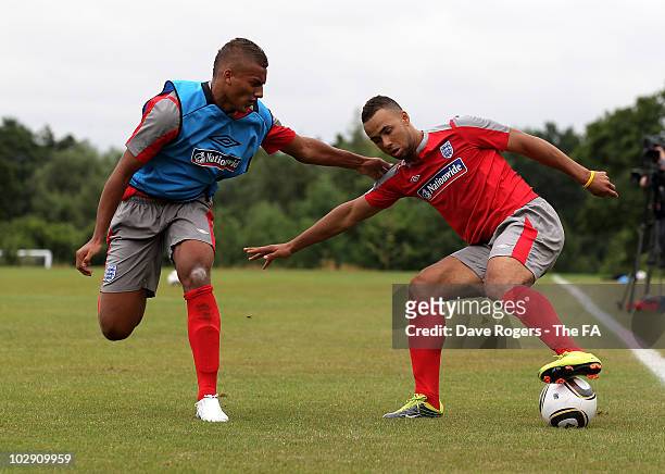 John Bostock takes on Reece Brown during the England U19's training session at Warwick University on July 14, 2010 in Coventry, England.