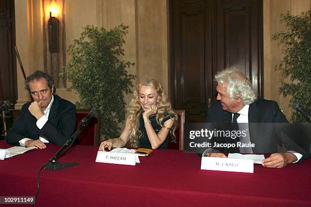 Maurizio Cadeo, Franca Sozzani, Giovanni Terzi attend Vogue Fashion's Night Out press conference on July 15, 2010 in Milan, Italy.