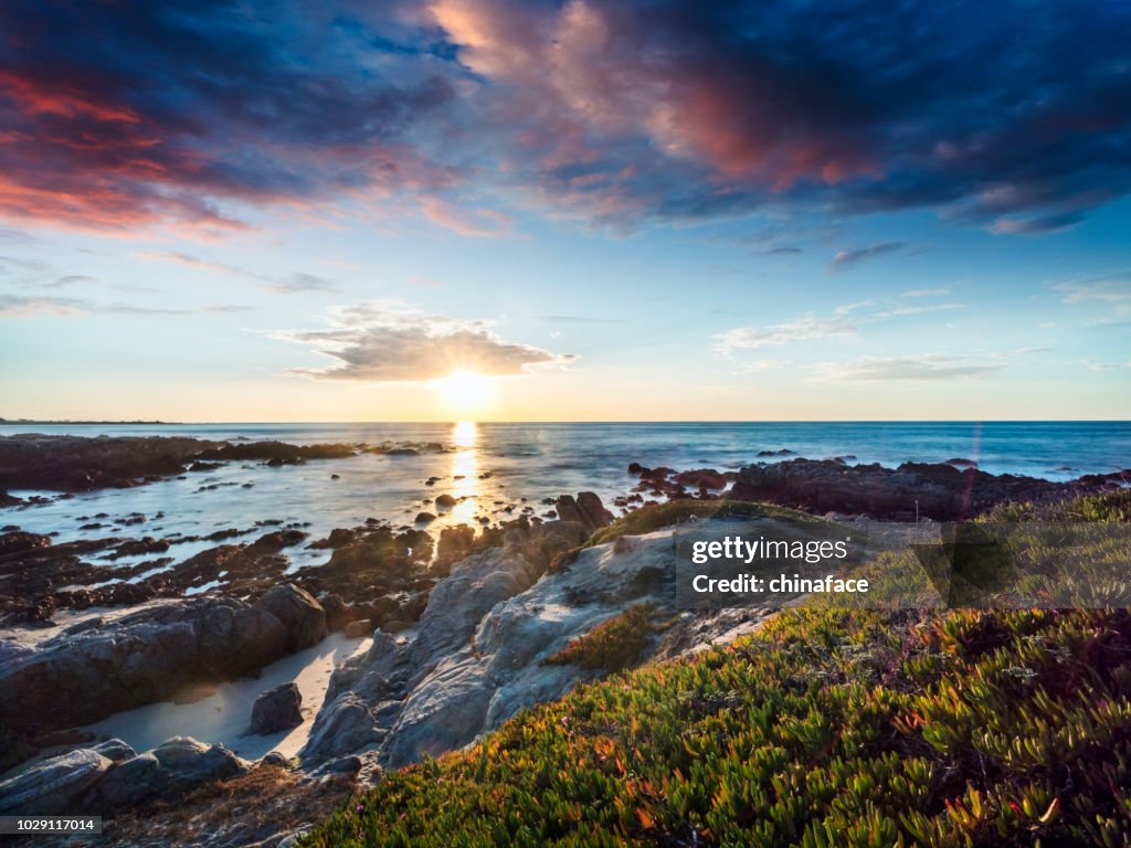Sunset over pacific ocean and carmel beach,California