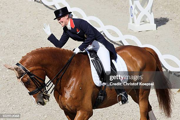 Laura Bechtolsheimer of Great-Britain celebrates her third place during the Teschinkasso prize as part of the Grand Prix CDIO dressage of the CHIO on...