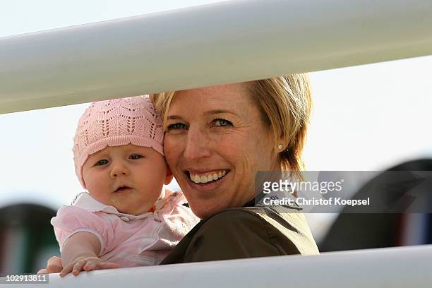 Meredith Michaels-Beerbaum and her daughter Brianne smile before the Mercedes-Benz Prize as part of the Meydan FEI Nations Cup of the CHIO on July...