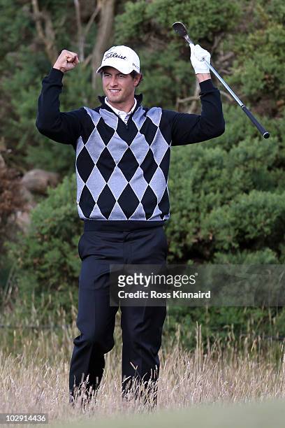 Adam Scott of Australia celebrates an eagle on the 12th hole during the first round of the 139th Open Championship on the Old Course, St Andrews on...