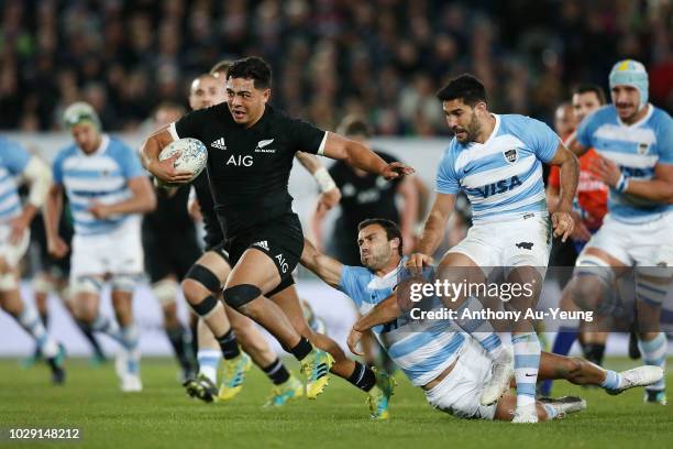 Anton Lienert-Brown of the All Blacks makes a break against Martin Landajo of Argentina during The Rugby Championship match between the New Zealand...