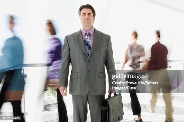 serious businessman - purple suit fotografías e imágenes de stock