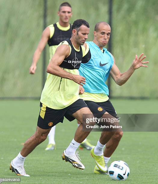 Ryan Giggs and Gabriel Obertan of Manchester United in action during a First Team Training Session as part of their pre-season tour of the US, Canada...