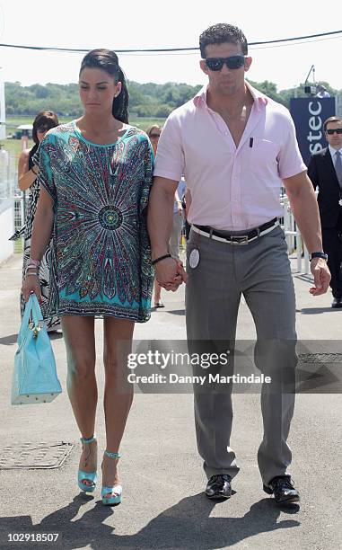 Katie Price aka Jordan and Alex Reid attend the Investec Ladies Day at Epsom Downs on June 4, 2010 in Epsom, England.