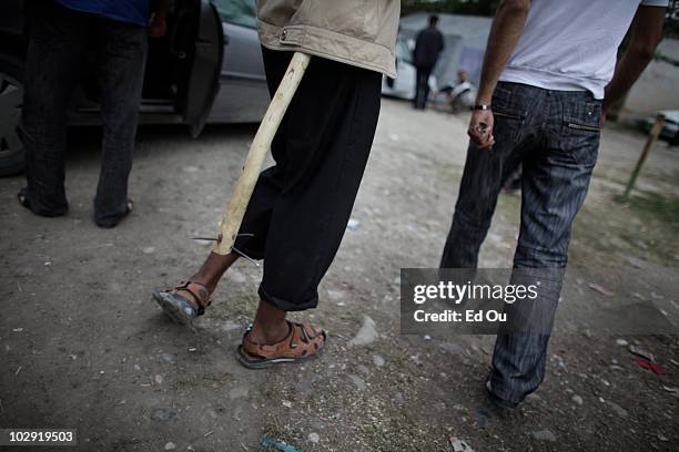 An ethnic Uzbek main carries a makeshift weapon consisting of a stick with nails on the Kyrgyz/Uzbek border on the outskirts of Osh, Kyrgyzstan June...