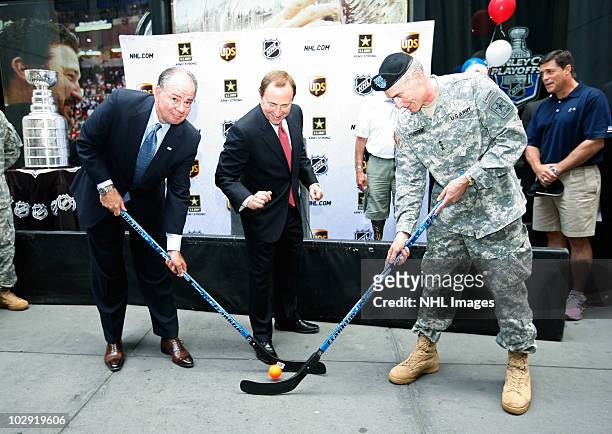 East Region President Glenn Rice, NHL Commissioner Gary Bettman and Lt. Gen. David Huntoon, Jr. Pose during the NHL, UPS & U.S. Army Street Hockey...