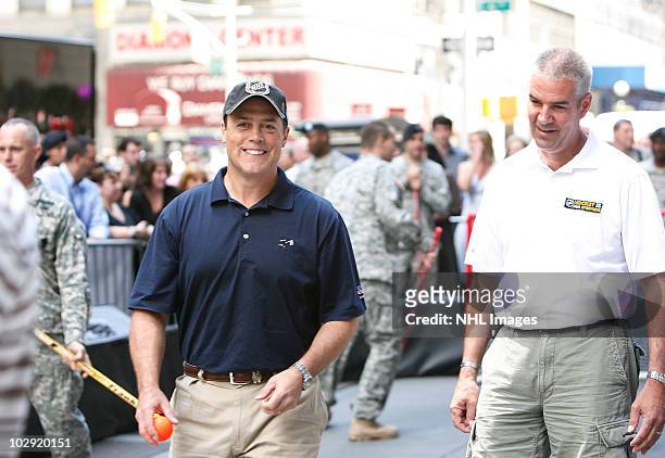 Hockey Hall of Fame NHL player Pat LaFontaine watches the action during the NHL, UPS & U.S. Army Street Hockey Equipment Donation To Troops In Iraq...