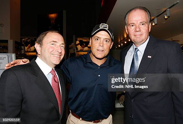 Commissioner Gary Bettman , former NHL player Pat LaFontaine and UPS East Region President Glenn Rice pose during the NHL, UPS & U.S. Army Street...