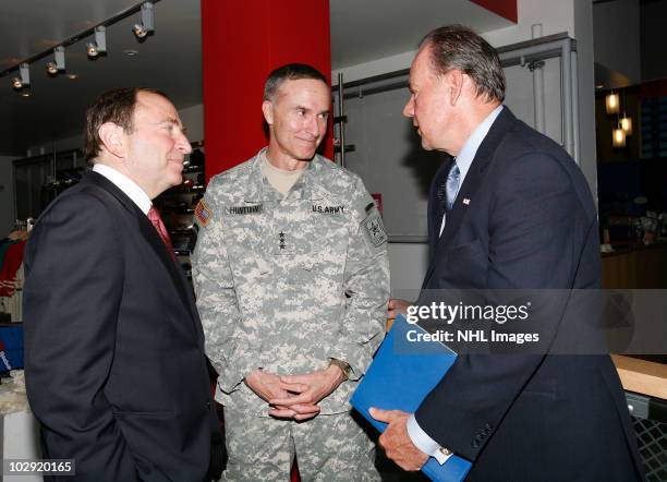 Commissioner Gary Bettman, Lt. Gen. David Huntoon, Jr. And UPS East Region President Glenn Rice speak to each other during the NHL, UPS & U.S. Army...