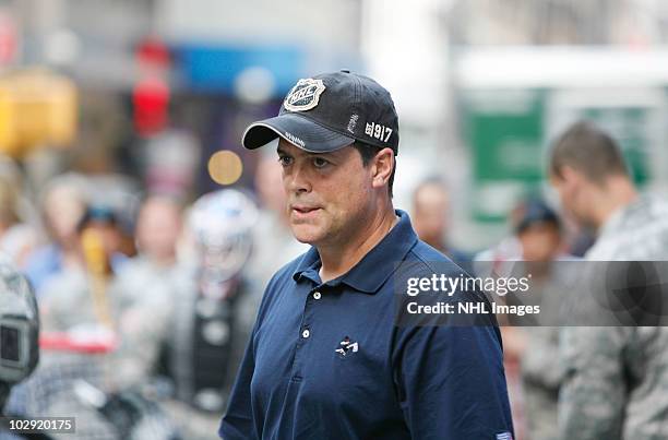 Hockey Hall of Fame NHL player Pat LaFontaine watches the action during the NHL, UPS & U.S. Army Street Hockey Equipment Donation To Troops In Iraq...