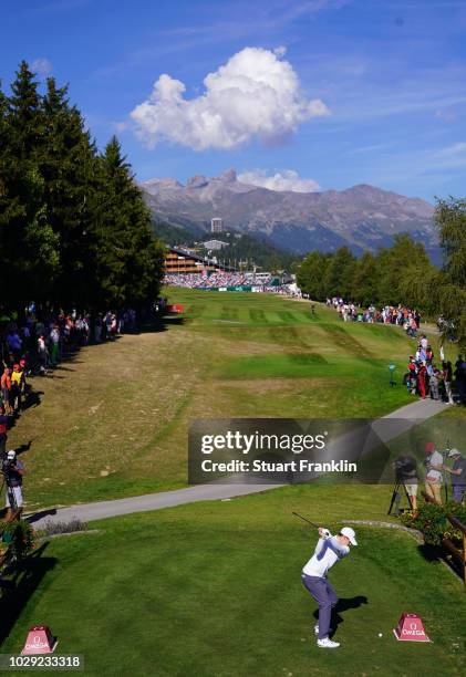 Matthew Fitzpatrick of England plays a shot on the 18th hole during the third round of The Omega European Masters at Crans-sur-Sierre Golf Club on...