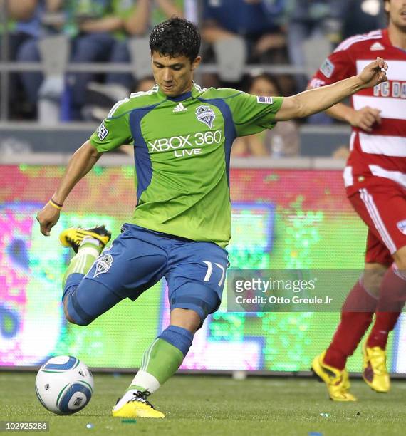 Fredy Montero of the Seattle Sounders FC passes against FC Dallas on July 11, 2010 at Qwest Field in Seattle, Washington.