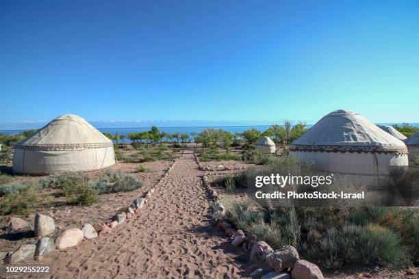 yurt camp in issyk kul lake - lake issyk kul stock pictures, royalty-free photos & images