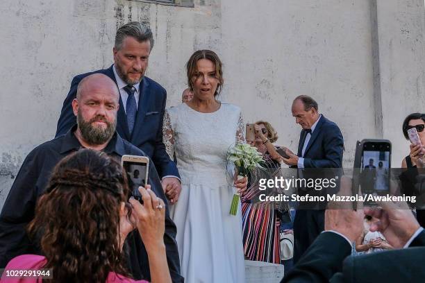 Luxembourg-born actress Desiree Nosbusch and German cameraman Tom Alexander Bierbaumer exit from the church of Oderzo after their marriage on...