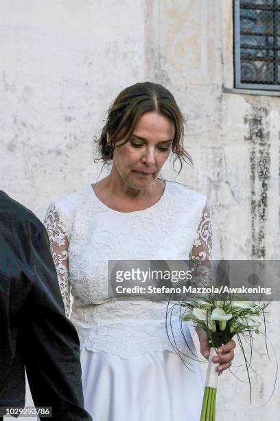 Luxembourg-born actress Desiree Nosbusch exits from the church of Oderzo after their marriage on September 8, 2018 in Oderzo, Italy.