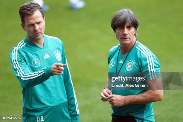 Head coach Joachim Loew and Oliver Bierhoff attend a Germany training session ahead of their International Friendly match against Peru at...