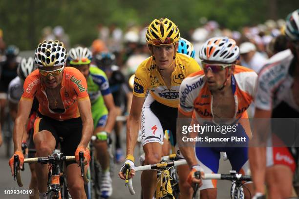 Luxembourg's Andy Schleck, in the yellow jersey, rides with the main group along stage 12 of the Tour de France July 16, 2010 in Mende, France. The...