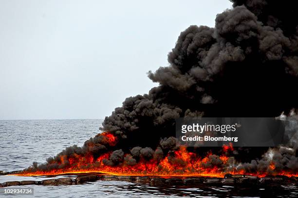 Controlled burn of oil is conducted near the source of the BP Plc Deepwater Horizon oil spill in the Gulf of Mexico off the coast of Louisiana, U.S.,...