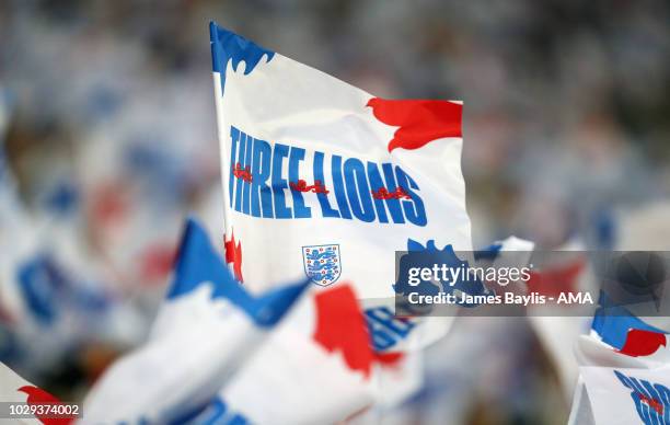 England fans wave Three Lions flags before the UEFA Nations League A group four match between England and Spain at Wembley Stadium on September 8,...