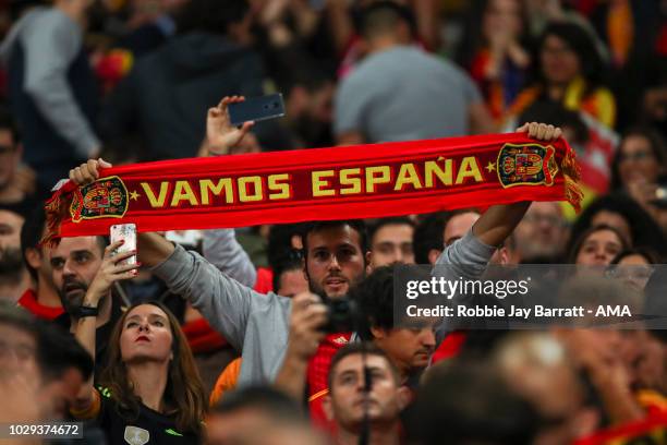 Fan of Spain holds up a scarf during the UEFA Nations League A group four match between England and Spain at Wembley Stadium on September 8, 2018 in...