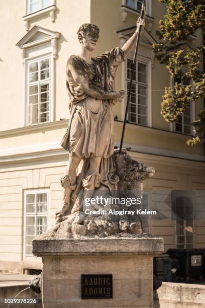 staute van adonis in liviv, oekraïne - adonis statue stockfoto's en -beelden