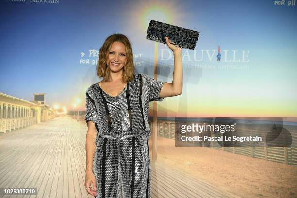 Jury Prize winner of the 44th Deauville American Film Festival, Jordana Spiro, for "Night comes on" poses during the Jury & Award Winners Photocall...