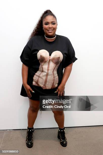 Rapper-Singer Lizzo poses backstage at the Christian Cowan Show during New York Fashion Week at Gallery II at Spring Studios on September 8, 2018 in...