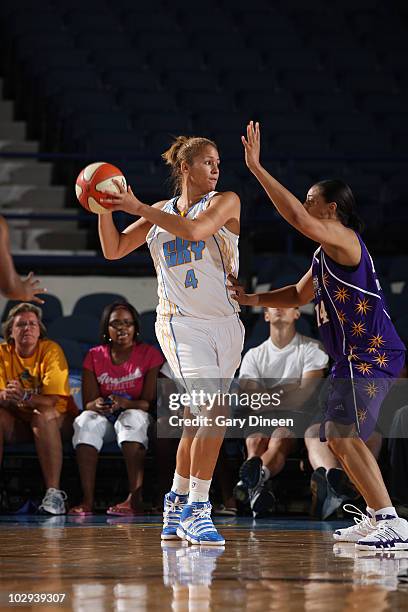 Christi Thomas of the Chicago Sky looks to pass as Lindsay Wisdom-Hylton of the Los Angeles Sparks defends during the WNBA game on July 16, 2010 at...