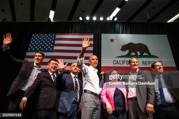 Josh Harder , TJ Cox , Gil Cisneros , former U.S. President Barack Obama, Katie Porter , Harley Rouda , and Mike Levin wave to supporters during a...