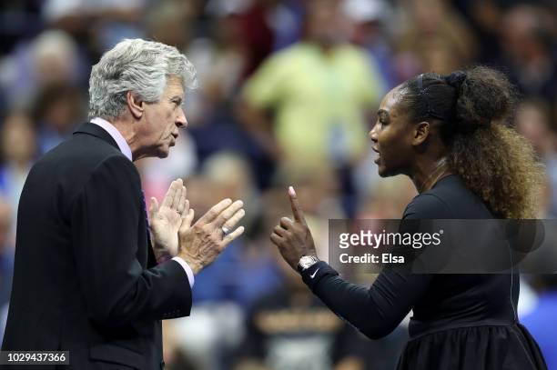 Serena Williams of the United States argues with referee Brian Earley during her Women's Singles finals match against Naomi Osaka of Japan on Day...