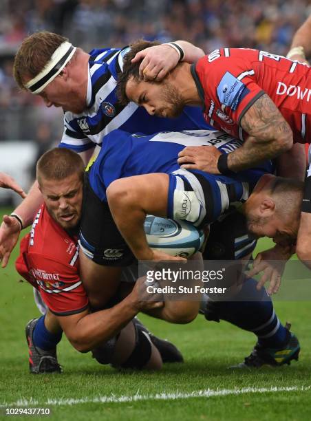 Gloucester player Danny Cipriani can't stop Bath player Tom Dunn charging towards the line during the Gallagher Premiership Rugby match between Bath...