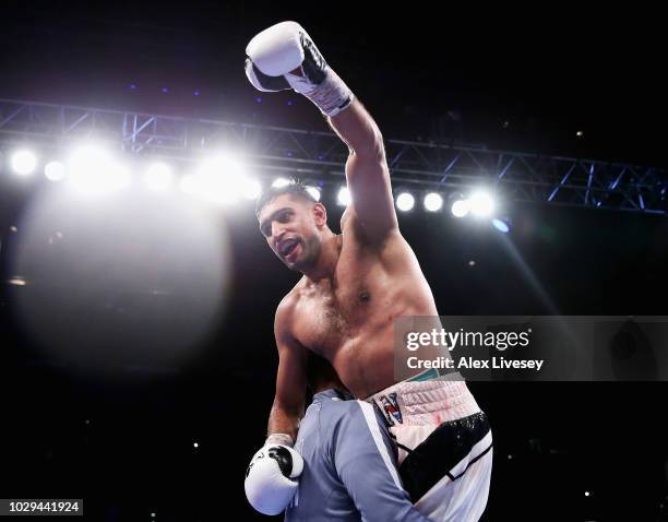 Amir Khan of England celebrates victory over Samuel Vargas of Canada during their Welterweight bout held at Arena Birmingham on September 8, 2018 in...