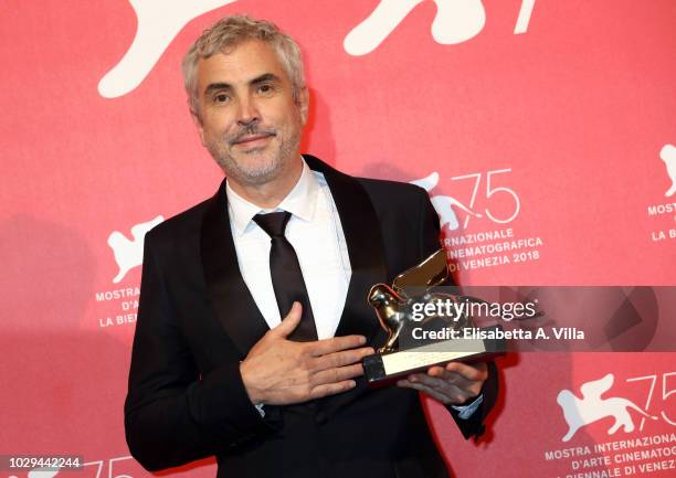Alfonso Cuaron poses with Golden Lion for the best movie fo 'Roma' at the Winners Photocall during the 75th Venice Film Festival at Sala Grande on...