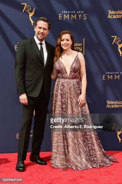 Alexis Denisof and Alyson Hannigan attend the 2018 Creative Arts Emmy Awards at Microsoft Theater on September 8, 2018 in Los Angeles, California.