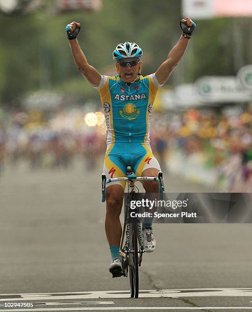 Astana rider Alexandre Vinokourov solos into the finish line to win the 196km Stage 13 of the Tour de France on July 17, 2010 in Revel, France. The...