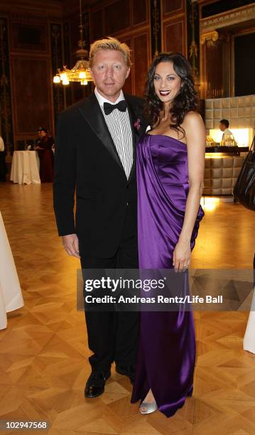 Boris Becker and his wife Lilly attend the amfAR Gala Vienna 2010 as part of the Life Ball 2010 at Parliament Of Austria on July 17, 2010 in Vienna,...