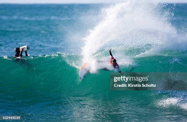 Taj Burrow of Australia surfs on July 17, 2010 in Jeffreys Bay, South Africa.