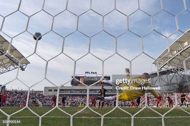 Sebastien Le Toux of the Philadelphia Union beats Stefan Frei of FC Toronto for the game winning goal on a penalty kick at PPL Park on July 17, 2010...