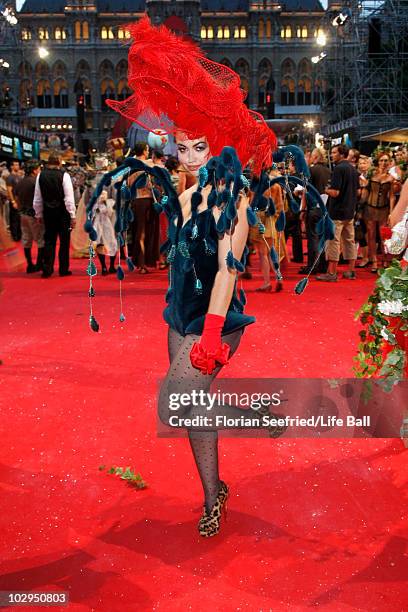 Singer Aura Dione attends the 18th Life Ball at the Town Hall on July 17, 2010 in Vienna, Austria. The Life Ball is an annual charity ball raising...