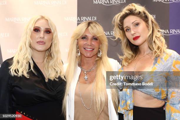 Hayley Hasselhoff, Pamela Bach and Taylor Hasselhoff attend the Marina Rinaldi By Fausto Puglisi Capsule Collection Launch at Marina Rinaldi on...