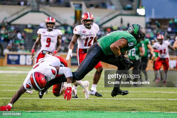 North Texas Mean Green wide receiver Jalen Guyton catches a touchdown pass over Incarnate Word Cardinals defensive back Jamarkese Williams during the...