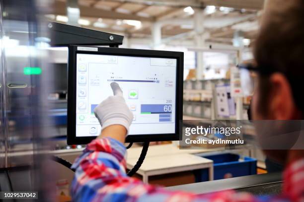 factory worker - cnc stock pictures, royalty-free photos & images